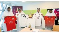 Representatives of Lekhwiya, Al Sadd, Al Rayyan and El Jaish  showing the jerseys their sides would be wearing ahead of the Qatar Cup semi-finals.
