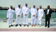 Hamad Murshid jabr Al Khanji, Head of Fishing Ports at the Ministry of Municipality and Environment, and Capt. Abdulla Al Khanji, CEO of Mwani (third left), and other officials during the opening of Al Wakrah Port's new harbour, yesterday. Pic: Abdul Basi