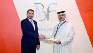 Mohamad Doughan (left), Business Development Director of TLN Qatar with Faisal Faqeeh, Chairman of Bin Faqeeh Real Estate Investment Co. at the signing ceremony. 
