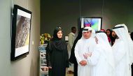 Visitors at the ‘Art of Science’ exhibition which started at the Cultural Village Foundation-Katara yesterday.