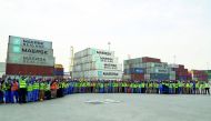 Jubilant workers of Qatar Ports Management Company — Mwani Qatar — marking the International Workers’ Day yesterday. Gifts and snacks were distributed among the workers who expressed their happiness on their day.