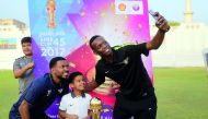 El Jaish players take a selfie with school students of Khalifa Secondary School for Boys during the Emir Cup trophy tour in Doha.