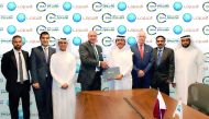 Bassel Gamal, Group Chief Executive Officer of QIB;  and Mubarak A. Al Hajri, Chief Executive Officer and MD of GDI shaking hands after the signing ceremony.