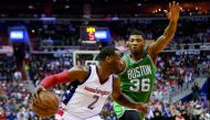 Washington Wizards guard John Wall (left) dribbles the ball as Boston Celtics guard Marcus Smart defends in the third quarter in game six of their second round of the 2017 NBA Play-offs at Verizon Center on Friday.