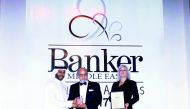Dr R Seetharaman (centre), Group CEO of Doha Bank, receiving  the award at Emirates Tower Hotel, Dubai, recently.  