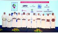 Minister of Energy and Industry, H E Dr Mohammed bin Saleh Al Sada (fifth right); and Saad Sherida Al Kaabi (sixth right), the President & CEO of QP, with the recipients of the awards at  the Qatar’s energy and industry sector’s ‘17th Annual Qatarisation 
