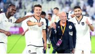 Eyeing another trophy: Al Sadd's head coach Jesualdo Ferreira (centre) celebrates along with his players their 2-1 victory over El Jaish in the Qatar Cup final at Al Sadd Stadium earlier this month. Al Sadd are looking for a double with a win over Al Rayy