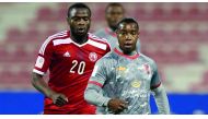 Asim Madibo (right) in Lekhwiya's colours during a QSL match in recently-concluded season last month.