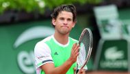 Austria's Dominic Thiem celebrates after winning his match against Serbia's Novak Djokovic at the French Open in Paris, yesterday.