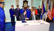 Minister of State for Defence Affairs H E Dr Khalid bin Mohammed Al Attiyah shaking hands with US Secretary of Defence James Mattis after signing an agreement for the purchase of F-15 fighter jets, with an initial cost of $12bn, in Washington, yesterday.