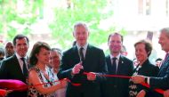 French Economy Minister Bruno Le Maire cutting the ribbon to launch the summer sales of a French department store in Paris, yesterday.