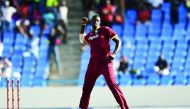West Indies' captain Jason Holder celebrates after bowling out India's Hardik Pandya during their fourth One Day International (ODI) at the Sir Vivian Richards Cricket Ground in St. John's, Antigua, on Sunday.