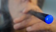 A woman smoking e-cigarette in Washington, DC (AFP / Paul J Richards)
