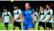 Qatar SC coach Gabriel Calderon leads his team during a training session in Doha.