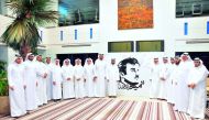 The chairman of QIB, Sheikh Jassim bin Hamad bin Jassim bin Jaber Al Thani (ninth from left),  members of the Board of Directors, and other senior officials of the Bank after the signing at QIB’s headquarters in Grand Hamad Street, yesterday.  

