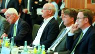 FROM RIGHT: Matthias Wissmann, President of the German Automobile Industry Association; Harald Krueger, CEO, BMW; Dieter Zetsche, CEO, Daimler AG; and Matthias Mueller, CEO, Volkswagen at the meeting  with German federal ministers in Berlin, yesterday.