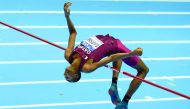 Qatari star  athlete Mutaz  Essa Barshim  competes in the men’s high jump at the World Indoor Athletics championships in Sopot, Poland in this file photo.