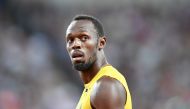 Usain Bolt of Jamaica gestures during the 