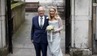 FILE PHOTO: Media Mogul Rupert Murdoch and former supermodel Jerry Hall outside St Bride's church following a service to celebrate their wedding which took place on Friday, in London, Britain March 5, 2016. Reuters / Peter Nicholls