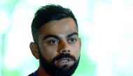 Indian captain Virat Kohli talks to reporters in Pallekele