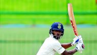 India’s Shikhar Dhawan watches the ball after hitting a cut during the first day of the third and final Test match against Sri Lanka at the Pallekele International Cricket Stadium in Pallekele, Kandy yesterday.