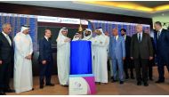 IHG’s Deputy CEO Mohammad Ghanim Al Hodaifi Al Kuwari (fourth left) along with Qatar Stock Exchange CEO Rashid bin Ali Al Mansoori (fifth left), IHG Board Member Hamad Ghanim Al Hudaifi Al Khuwari (third left) and other officials, ringing the opening bell