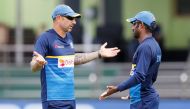 Sri Lankan cricket interim head coach Nic Pothas reacts as he talks with captain Upul Tharanga ahead of their first One Day International cricket match against India. (REUTERS/Dinuka Liyanawatte)