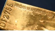 A gold bar is presented at the German Central Bank in Frankfurt am Main on August 23, 2017. (AFP/ DPA /Arne Dedert) 