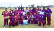 Jubilant Qatari players and officials pose for a photograph after winning the third place of the ICC World Cricket League  Division 5 Tournament in Benoni, South Africa yesterday.
