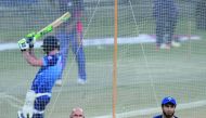 International World XI cricketers Hashim Amla (left) and Imran Tahir take part in a practice session at the Gaddafi Cricket Stadium in Lahore yesterday.