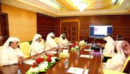 Minister of Awqaf and Islamic Affairs H E Dr Ghaith bin Mubarak Al Kuwari with officials at the launch of the programmes.