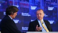 President of Turkey Recep Tayyip Erdogan speaks with Bloomberg Editor-in-Chief John Micklethwait (L) during the inaugural Bloomberg Global Business Forum at the Plaza Hotel in New York, NY, United States on September 20, 2017. The forum will hosts more th