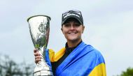 Anna Nordqvist from Sweden holds her trophy after winning the Evian Championship last week.