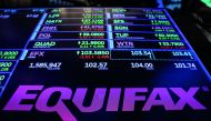 The logo and trading information for Credit reporting company Equifax Inc are displayed on a screen on the floor of the New York Stock Exchange (NYSE) in New York, yesterday.