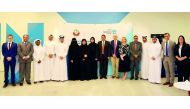 The officials of the Hamad Bin Khalifa University (HBKU) with the Ministry of Justice’s Legal and Judicial Studies Center during the MoU signing ceremony. 