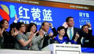 Chimin Cao, Co-Founder and Chairman for RYB Education Institution and Yanlai Shi, Co-Founder and CEO for RYB Education Institution, ring the opening bell together to celebrate their company’s IPO at the New York Stock Exchange (NYSE) in New York, yesterda