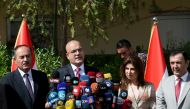 Minister of Transportation of IKRG Mevlud Bavemurad (C) holds a press conference after Iraqi Government demanded Iraqi Kurdish Regional Government to hand over airports at the area, at Ministry building in Erbil, Iraq on September 27, 2017. (Yunus Kele? /