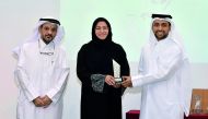 FROM LEFT: QU Vice-President for Academic Affairs, Dr Omar Al Ansari; Prof Maha Khalil Al Hendawi and QU President Dr Hassan Al Derham at the annual convocation yesterday.