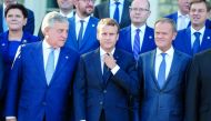 (Front row, L-R) The President of the European Parliament, Antonio Tajani, French President Emmanuel Macron and European Council President Donald Tusk and other participants pose for a family photo during a European Union summit in Tallinn, Estonia, on Se