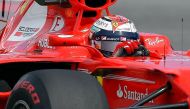 Ferrari's Finnish driver Kimi Raikkonen powers his car during the third practice session of the Formula One Malaysia Grand Prix in Sepang on September 30, 2017. / AFP / MANAN VATSYAYANA
