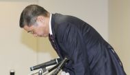 Hiroto Saikawa, President and Chief Executive Officer of Nissan Motor, bows at the end of his press conference at the company's headquarters in Yokohama, Kanagawa prefecture on October 2, 2017. AFP / Jiji Press