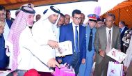 Ali bin Khatem Al Mihshadi (second left), Chairman of Al Gannas Society, and Mohammed bin Abdullatif Al Misnad (third left), Vice-Chairman of Al Gannas Society, at the fifth international falconry festival which concluded yesterday in Morocco.