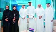 Mutaz Barshim, a gold medal winner at the 2017 World Championships poses for a picture with Ooredoo’s Chairman Sheikh Abdulla bin Mohammed bin Saud Al Thani and a host of senior Ooredoo management officials during a function held by Ooredoo to recognise t