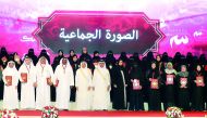 Deputy Prime Minister and Minister of State for Cabinet Affairs H E Ahmed bin Abdullah bin Zaid Al Mahmoud and other dignitaries with honourees at an event to celebrate World Teachers’ Day in Doha yesterday.