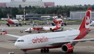 This file photo taken on September 12, 2017 shows aircrafts of German airline Air Berlin parked at the airport in Duesseldorf, western Germany, after the troubled airline had to cancel flights due to 