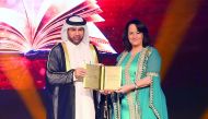 Katara General Manager Dr Khalid bin Ibrahim Al Sulaiti presenting Sameha Kheres, the annual Katara Prizes for Arabic Novel awards at a ceremony held yesterday at Katara.
