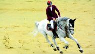 Hamad Nasser Al Qadi, astride SIEC Lonnie, in action during the feature competition - 130/140cm - of the opening round of QR1m ‘Hathab’ showjumping series at Al Shaqab, Indoor Arena yesterday.