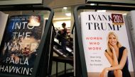 A woman walks past a shelf displaying the book 'Women Who Work: Rewriting the Rules for Success' by Ivanka Trump at a Barnes and Nobel bookstore in New York on May 2, 2017 (AFP / Jewel Samad) 