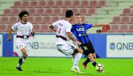 Al Markhiya’s Rebin Ghareeb Solaka (left) and Al Sailiya’s Temurkhuja Abdukholikov vie for the ball possession during their QNB Stars League match.