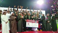 Qatar University players and team officials celebrate with tournament officials after they emerged University League football champions at Qatar Foundation’s Recreation Centre Pitch 1 in this file picture of February 2017.